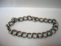 ED6782 Double Loop Silver Metal Charm Bracelet by Ganz