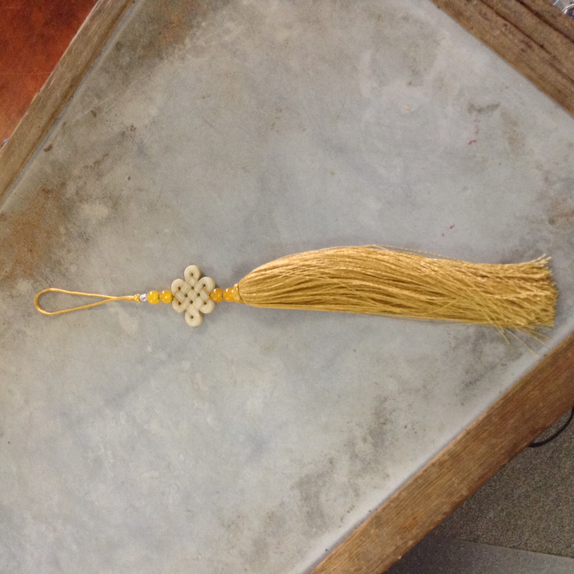 Oriental Hanging Tassel Display Alabama Furniture