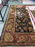 Rug/ hand knotted wool black, red & gold floral 9' x 12'